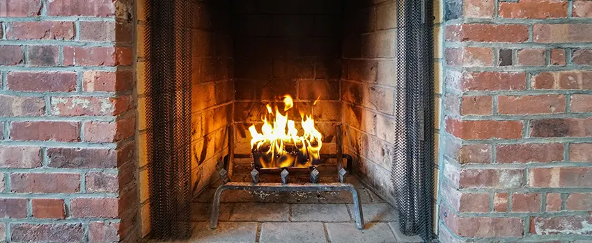 Repairing Damaged Fireplace Tiles in Mineola, New York